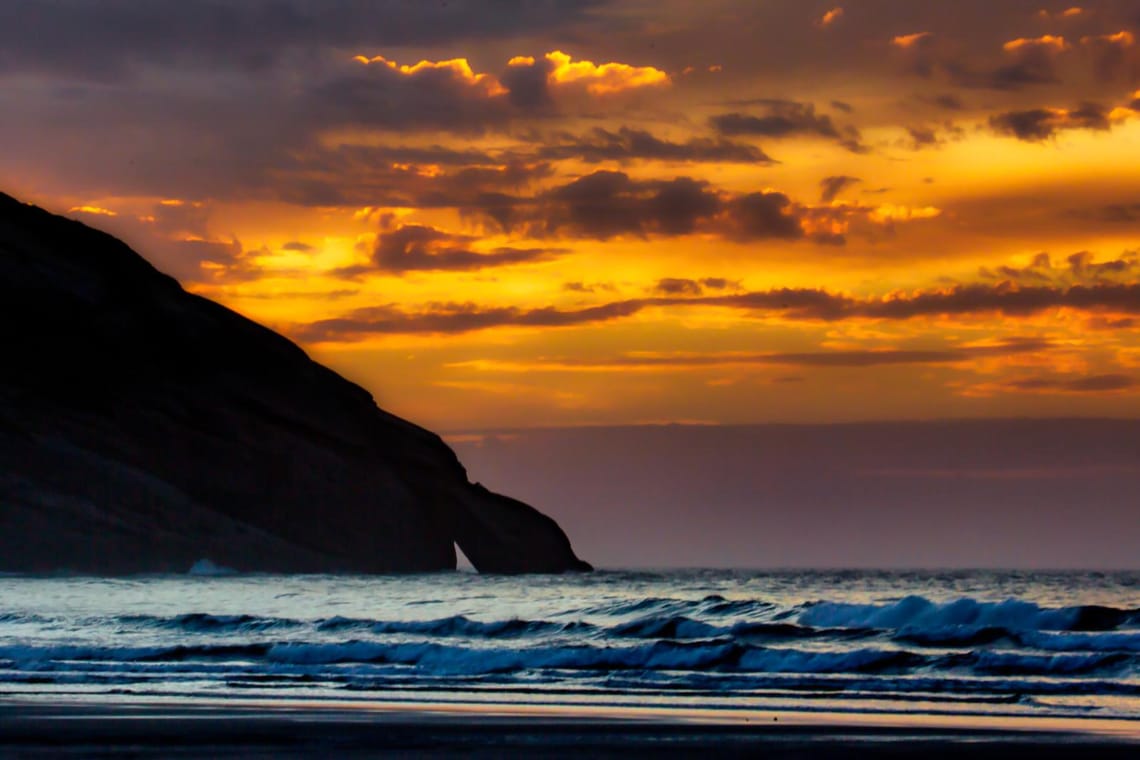 Fiery skies at Wharariki Beach