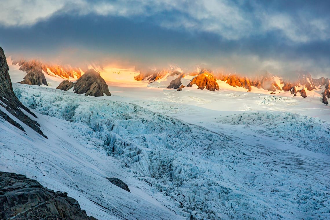 Burst of sunlight on the Southern Alps peaks