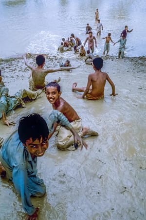 There's something about kids and mud