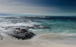 Receding tide at Otarawairere